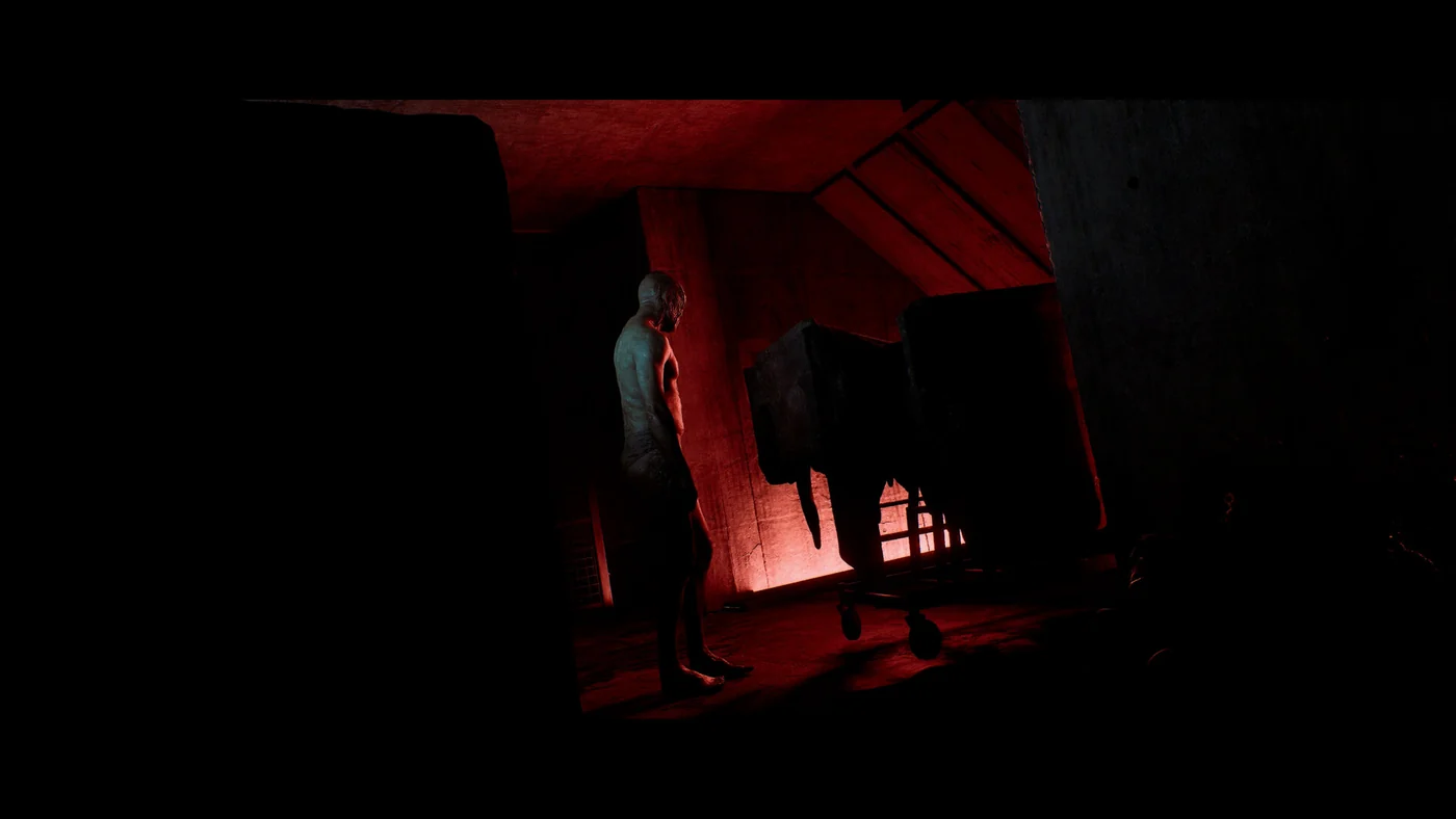 SILENT HILL: Townfall shows a figure standing in a dim room illuminated by red light.